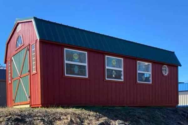 Large Red Dutch Barn with lots of windows