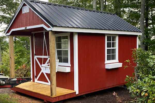 Red and white playhouse shed